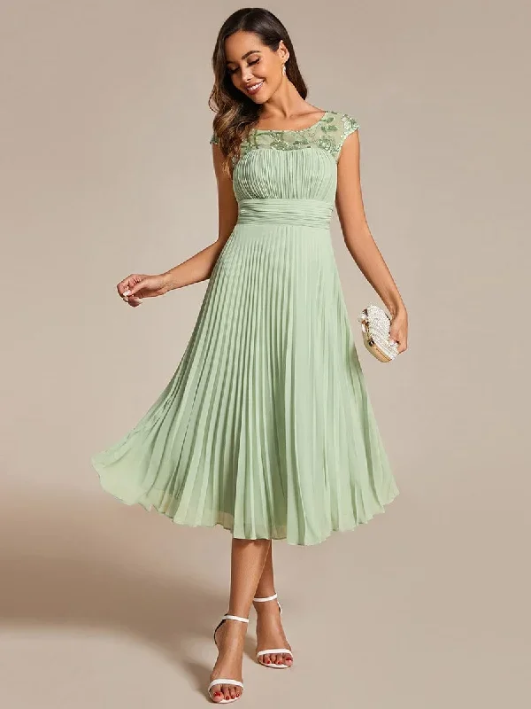 a-line-pleated-chiffon-wedding-guest-dress-with-round-neckline-and-cap-sleeves-eg02095