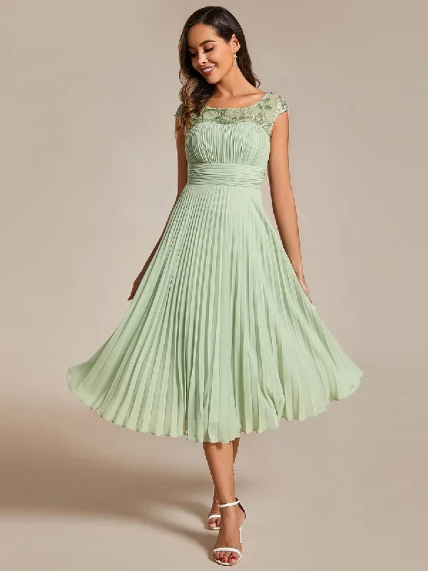 a-line-pleated-chiffon-wedding-guest-dress-with-round-neckline-and-cap-sleeves-eg02095